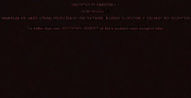 Desktop wallpaper set by GandCrab 5.1.0 with the warning message plus reference to ransom note